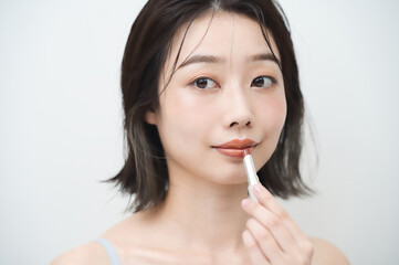 化粧・口紅・女性