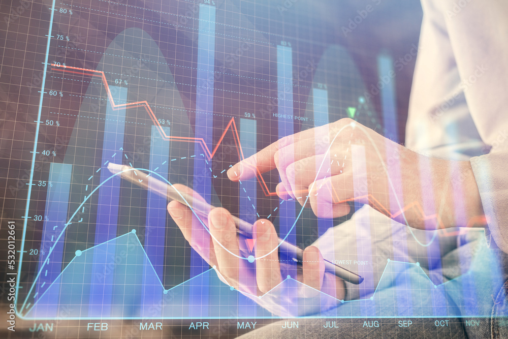 Aufkleber double exposure of man's hands holding and using a digital device and forex graph drawing. financial