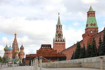 Red square in Moscow with Kremlin tower, Lenin mausoleum and St. Basil's Cathedral background of...