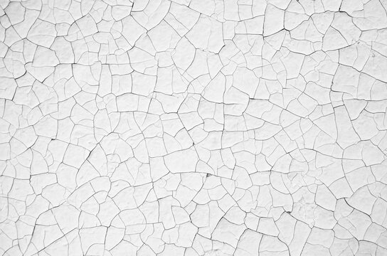Old white cracked wall texture background