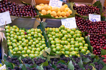  Green plums in bazaar market place