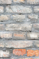  Vertical brick wall background close-up.