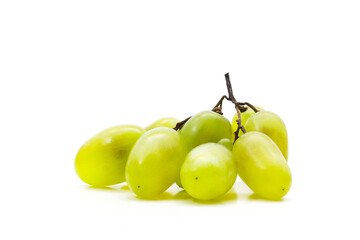 A bunch of grapes on a white background. Shallow depth of field