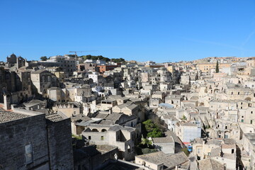 Fototapeta na wymiar The old town of Matera under a blue sky, Italy
