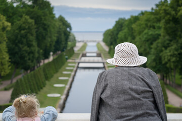 Grandmother and granddaughter walking