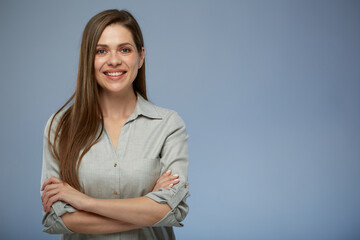 Confident smiling business woman with arms crossed. isolated female portrait.