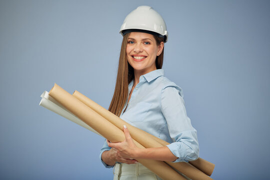 Student woman architect holding blueprints. Isolated female portrait on blue.