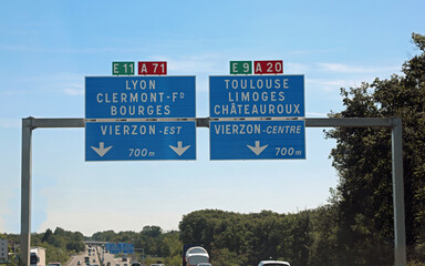 road sign with directions to go to French places
