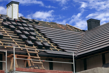 Building a house. laying the roof