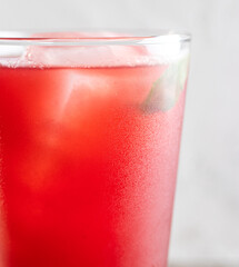 red cocktail with ice