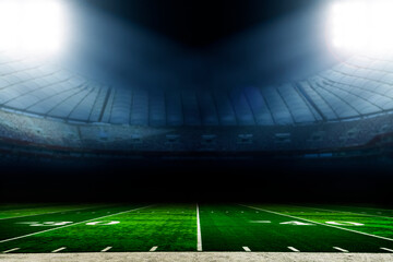 American football stadium with lights at night