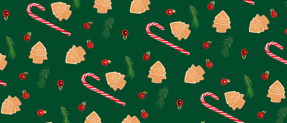 Many gingerbread cookies, candy canes and Christmas decor on green background. Pattern for design