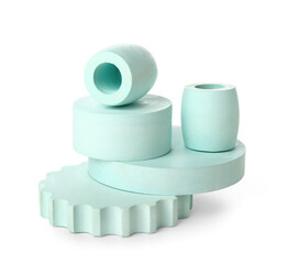 Different decorative podiums for presentation of cosmetic products on white background