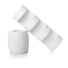 Different decorative podiums for presentation of cosmetic products on white background