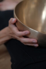 Singing copper bowl. Yoga, relaxation and meditation. Sound therapy, alternative medicine