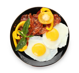 Plate of tasty fried eggs with bacon and vegetables on white background