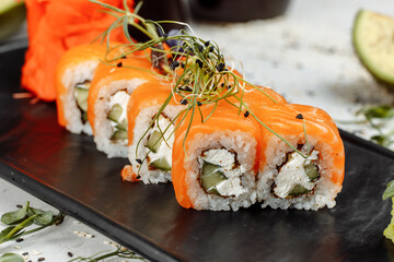 Sushi Philadelphia on a stone decorative plate