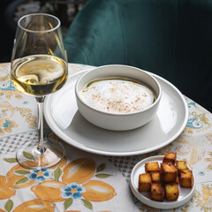 cappuccino soup which is a type of cream mushroom soup on a table, copy space. food concept