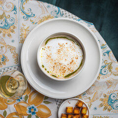 cappuccino soup which is a type of cream mushroom soup on a table, copy space. food concept