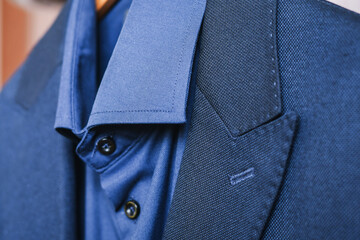 blue shirt and tie