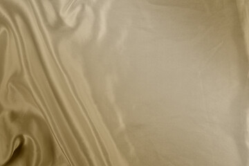 Naklejka premium Elegant Golden Silk Background with Copy Space