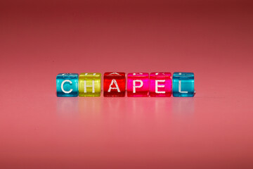 the word "chapel" made up of cubes	