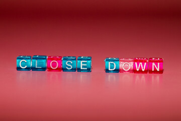 the word "close down" made up of cubes