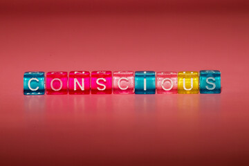 the word "consious" made up of cubes