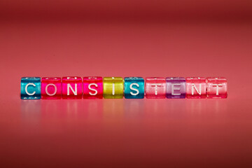 the word "consistent" made up of cubes