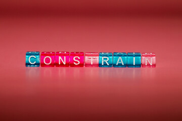 the word "constrain" made up of cubes