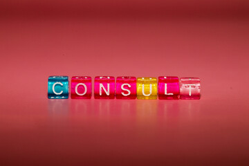 the word "consult" made up of cubes