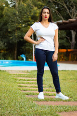 Beautiful brunette girl in a park