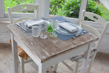 lunch set table in a bay window - 532048041