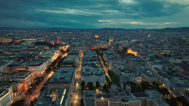 illumination flight over Vienna city district aerial panorama. Austria