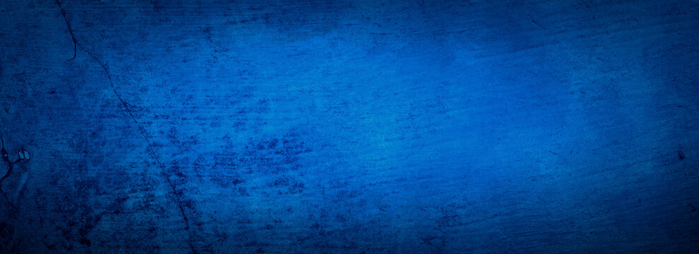 Blue background, old grunge texture, vintage painted scratched antique blue background in textured wood board design banner or distressed paper, sapphire blue color