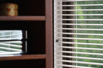 close up of a window with a glass of wine