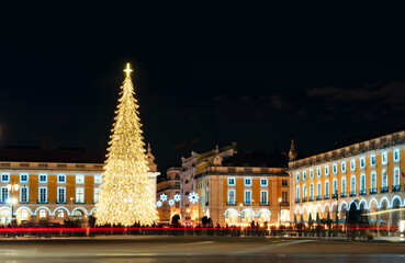 Praça do Comércio (commerce square), illuminated with decoration and Christmas tree in lisbon downtown, Portugal - Christmas background
 - obrazy, fototapety, plakaty