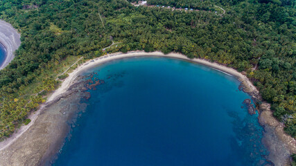 Fototapeta na wymiar Sidey Beach, This beautiful beach is located in Manokwari, West Papua Province