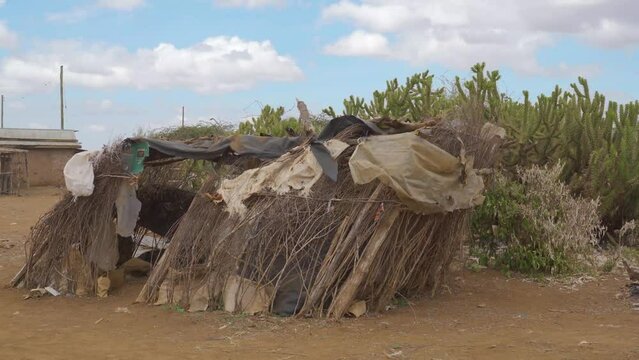 Maasai village in an empty dry land in Africa. 