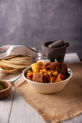 Mole de Olla. It is a balanced one pot meal, typical dish of the central region of Mexico, it is a soup-type stew based on beef and vegetables. It is consumed hot and accompanied with corn tortillas.