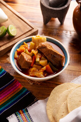 Mole de Olla. It is a balanced one pot meal, typical dish of the central region of Mexico, it is a soup-type stew based on beef and vegetables. It is consumed hot and accompanied with corn tortillas.