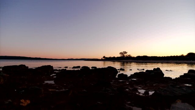 Time lapse shot of dusk over Dugi Otok in Suha Uvala bay on Uglijan