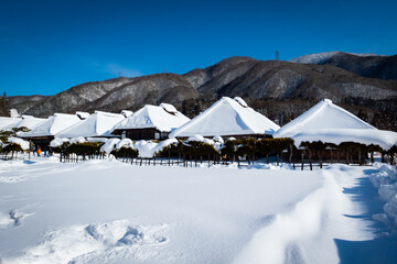 traditional houses and winter landscape in the mountains