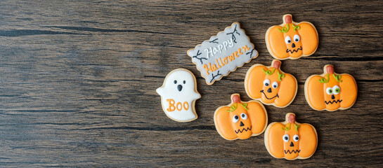 Happy Halloween day with funny Cookies set on wooden table background. Trick or Threat, Hello October, fall autumn, Festive, party and holiday concept