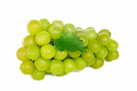 Sweet fruit green grapes isolated on white background