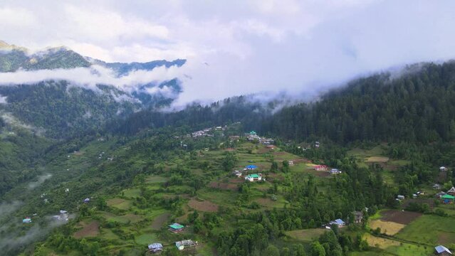 Drone Shot of a cloudy Sainj Valley in Himachal Pradesh near Manali, Kasol