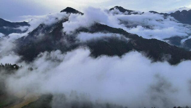 Drone Shot of a cloudy Sainj Valley in Himachal Pradesh near Manali, Kasol