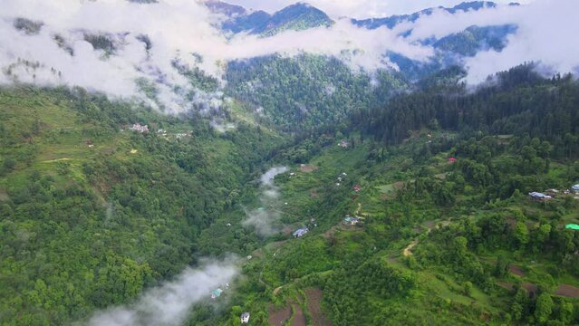 Drone Shot of a cloudy Sainj Valley in Himachal Pradesh near Manali, Kasol
