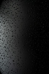 Water droplets on the floor with black background