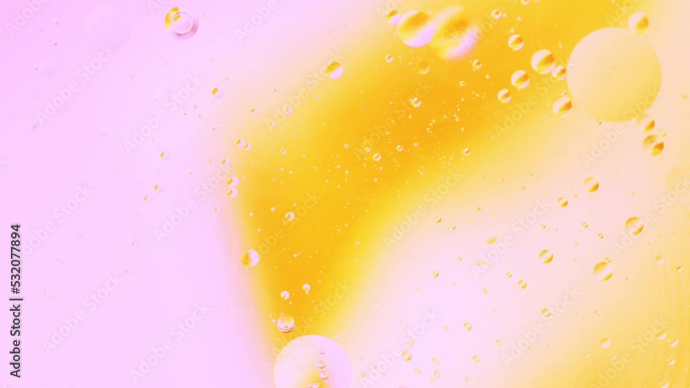 Poster real close up oil bubbles in water rotation with color gradient abstract mixing background.